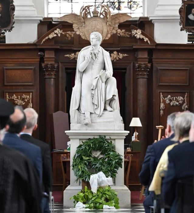A wreath-laying ceremony at Byron's statue in the Wren Library of Trinity College, Cambridge University and the words of Kyriaki Mitsou, Hellenic Foundation of Culture UK including a message from the Mayor of Messolonghi, Spyros Diamantopoulos 