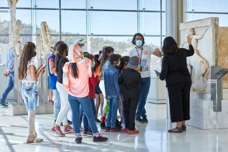 refugees migrants at acropolis museum
